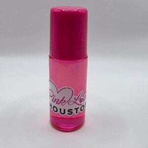 Pink perfume bottle labeled "Pink Love Houston".