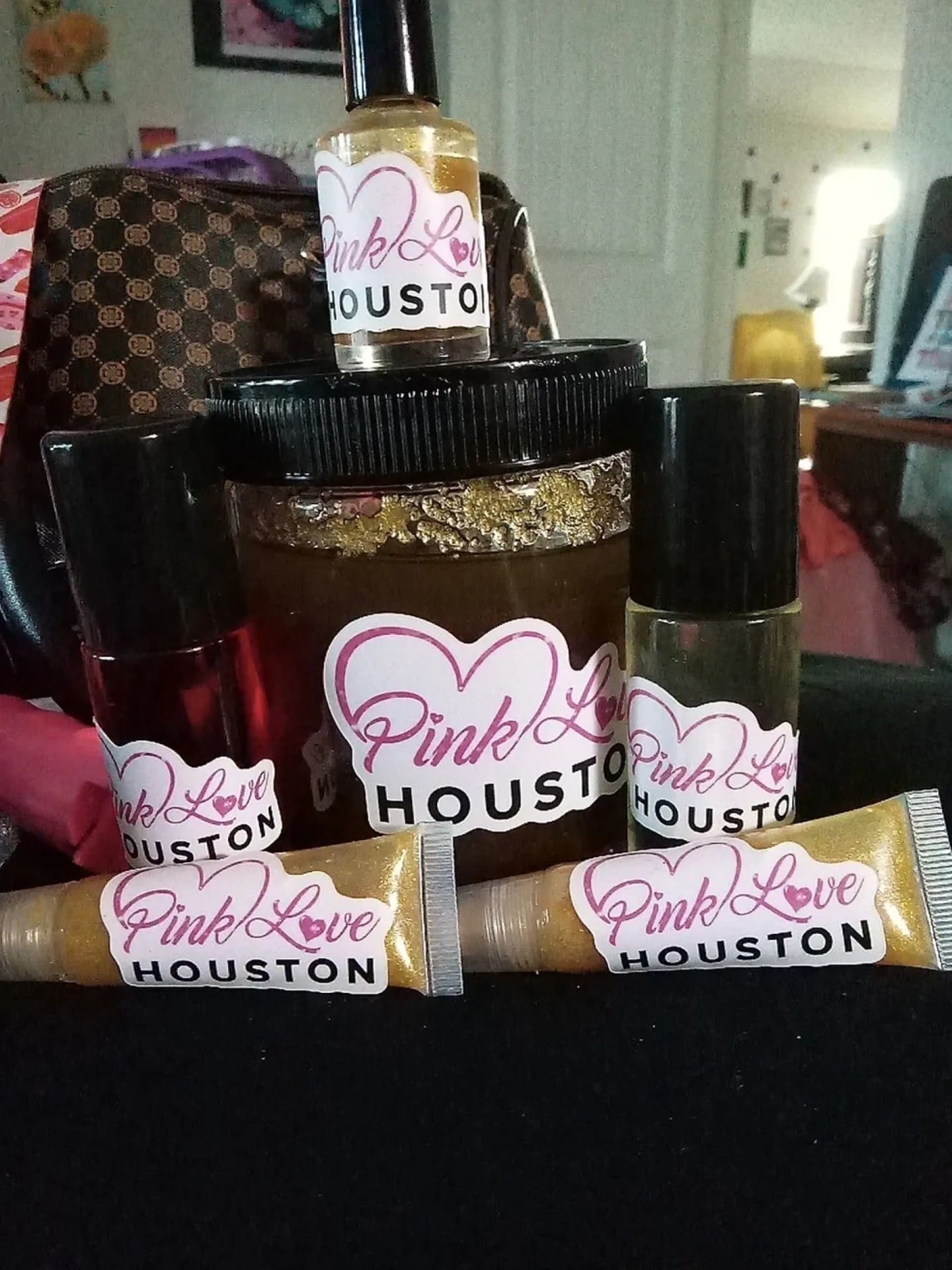 Pink Love Houston beauty products display.